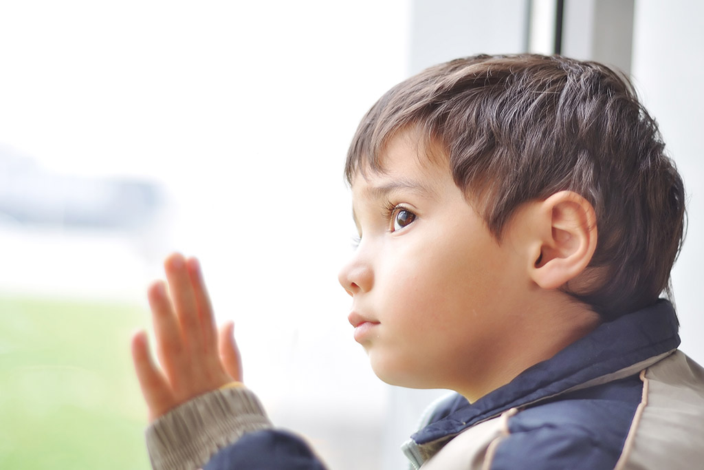 A child looking out a window