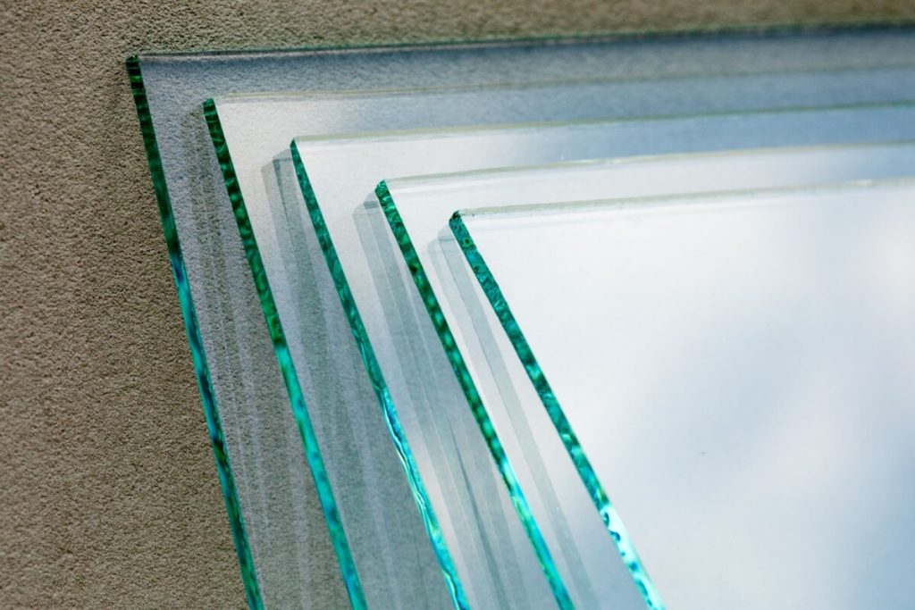 Sheets of glass stacked side by side during manufacturing