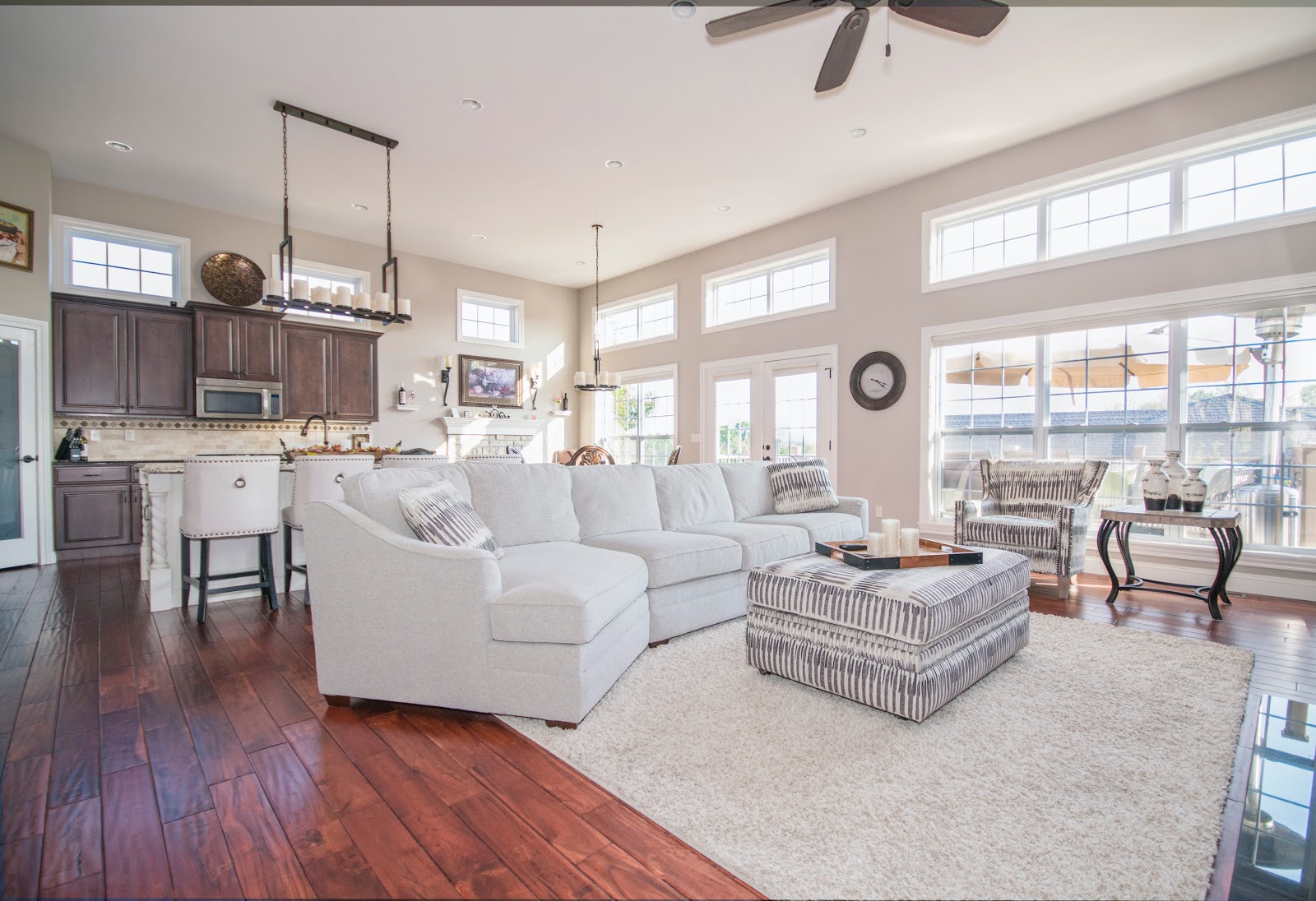 The living room of a home with big new windows