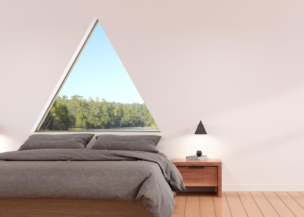 : A room with triangular custom windows