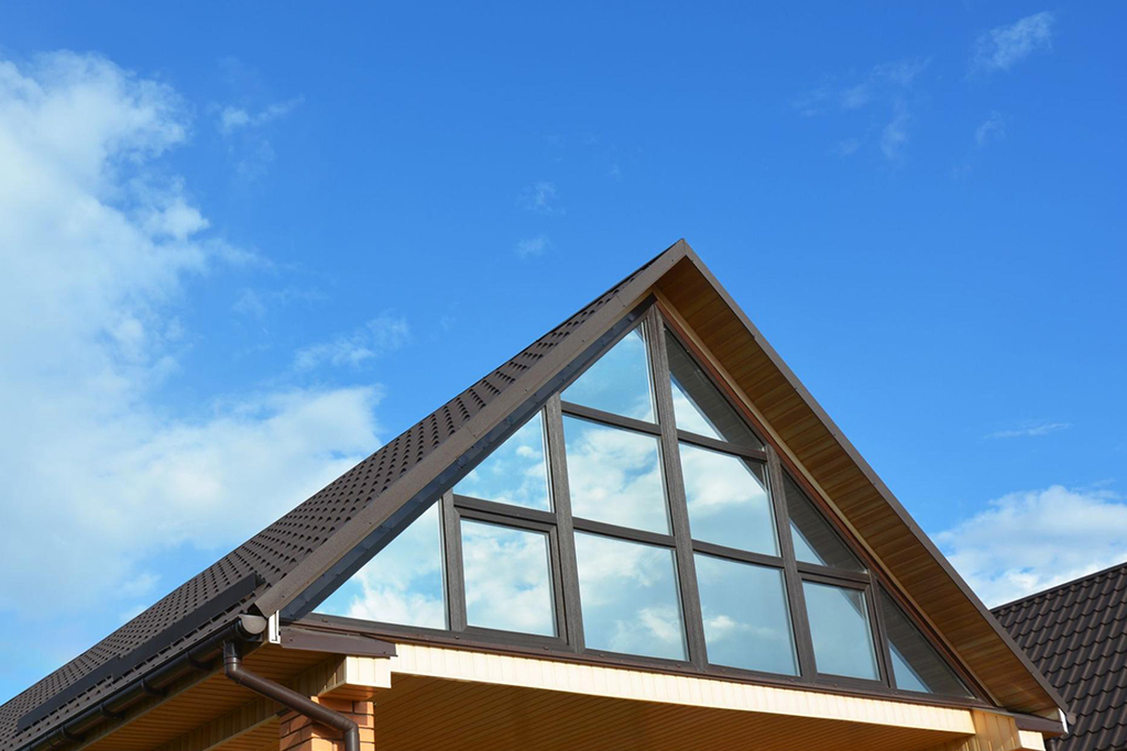 A triangular window fitted into the home’s gable