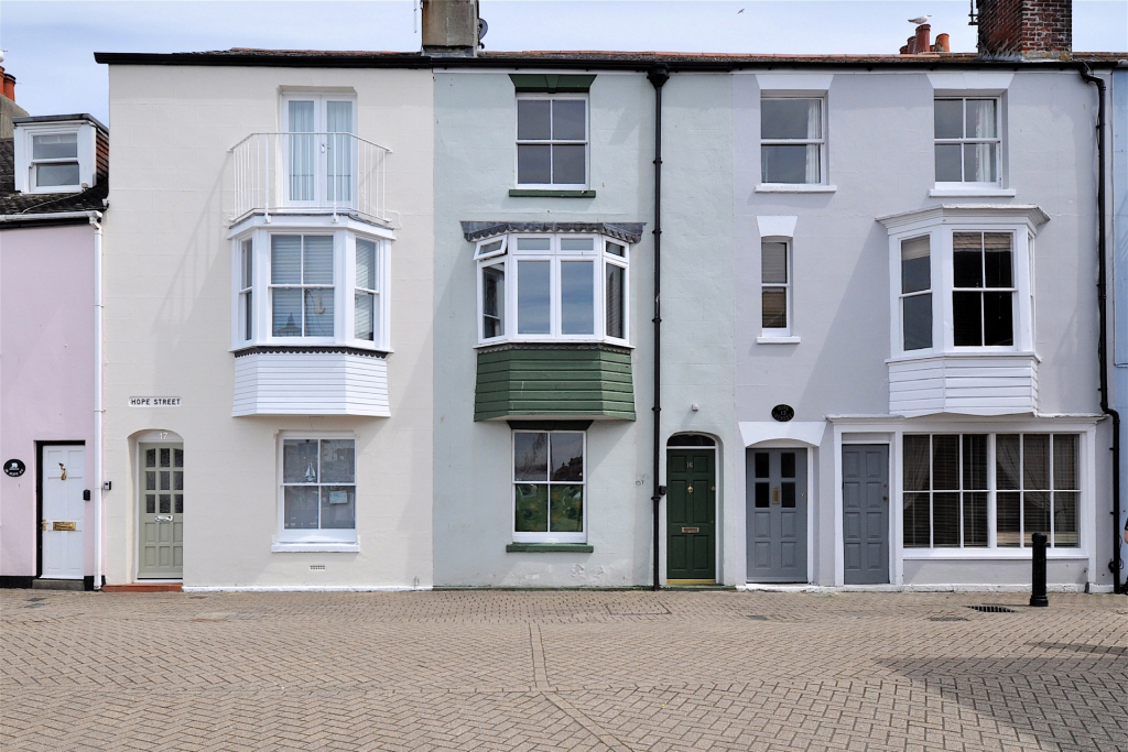 A row of modern-style oriel bay windows with double-hung and casement variations 